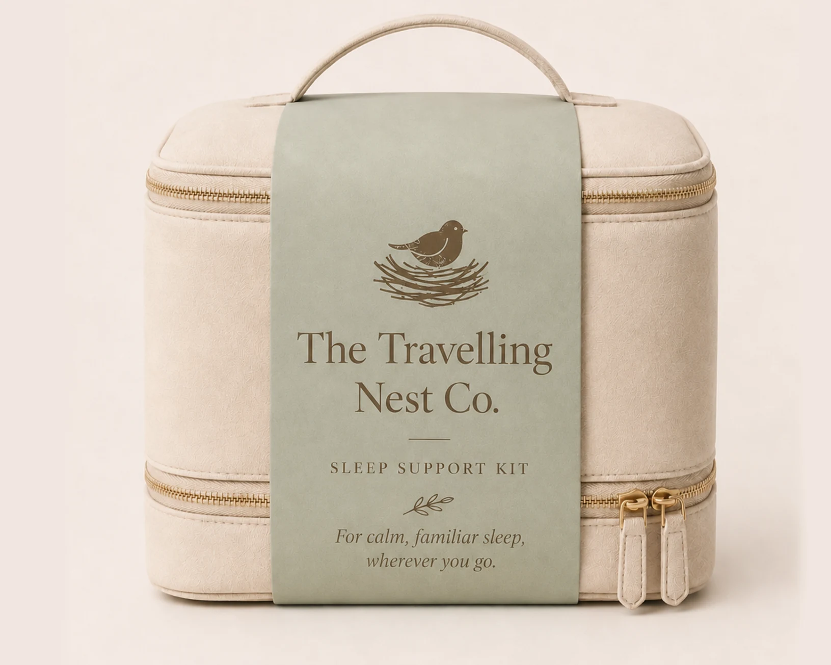 Luxury baby travel kit with pouch, skincare, muslins, and soft night light on a hotel bed